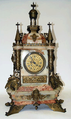 A rare Nineteenth Century mantel clock with marble, onyx, bronze and ormolu mounts was stunningly designed and brought a solid $2,430.
