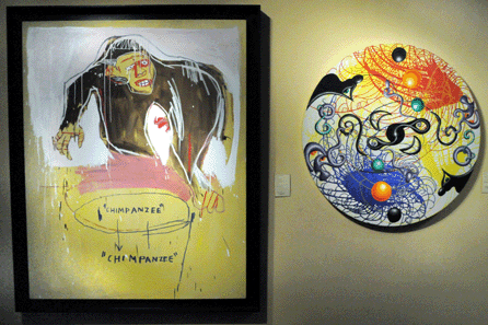 "Chimp†by Jean Michel Basquiat was one of the two works by the artist featured at Galerie Fabien Boulakia, Paris. "Whirl Swirl,†right, is an oil and acrylic on canvas, 1986, by Kenny Scharf.