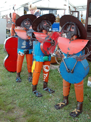 The colorful Mexican folk art band crafted from 55-gallon drums greeted shoppers at Lutz's Antiques, Carlisle, Penn. ⁍idway Antiques Show