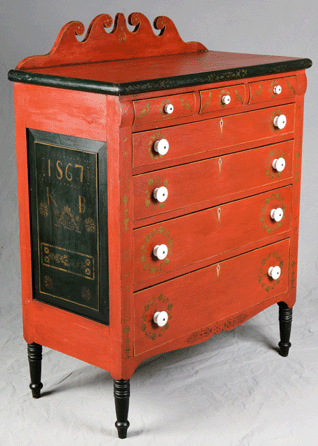 The cherry and tulip poplar Soap Hollow chest by Jeremiah Stahl is carved and painted distinctively. It came to the collection through the Westmoreland Society.