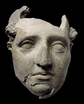 Head of a youth, Aï Khanum, early Second Century BC, unfired clay, 8¼ by 6 inches. National Museum of Afghanistan, Kabul. ₩musée Guimet, Thierry Ollivier photo
