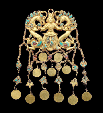 Headdress pendant depicting a "Dragon Master,†Tillya Tepe Tomb II, First Century AD, gold with turquoise, garnet, lapis lazuli, carnelian and pearls, 5 by 2 5/8  inches. National Museum of Afghanistan, Kabul. ₩musée Guimet, Thierry Ollivier photo