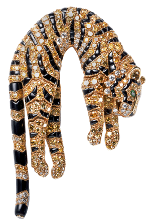 The articulated tiger clip brooch, Cartier Paris, was sold to Barbara Hutton in 1957. Comprising gold, single and brilliant-cut diamonds ranging from fancy intense yellow to near colorless marquise-shaped, it also has emerald eyes and fancy-shaped onyx making up the stripes. Nick Welsh ©Cartier.
