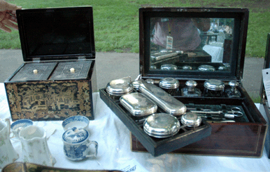 The Ensinger Collection, Surfside Beach, S.C., was showing an English traveling case, right, and a Chinese master caddy with pewter inserts, both circa 1840.