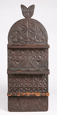 American carved spoon rack, late Eighteenth to early Nineteenth Century, likely of New Jersey origin, fetched $7,344.