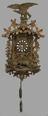 A huge, 62-inch-high Black Forest cuckoo clock had presale estimate of  $800․1,200, but a bidder in the gallery was so determined to have it, he drove the price to $3,565.