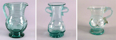 Among the pieces of aqua glass in the sale, a large, rare New York green-aqua lily pad pitcher combining type-2 and type-3 with threaded neck, 8 inches tall, sold for $35,100 against a high presale estimate of $6,000. A rare aqua type-1 lily pad vase with applied handles and crimped foot, attributed to the Redford Glass Works, New York, 6¾ inches high, sold for $1,170, well below the $3,000 low estimate. The pale aqua type-1 lily pad cream pitcher with applied circular foot, circa 1835, attributed to the Lancaster Glass Works, measures 4 3/8 inches high and sold for $3,276 against a high estimate of $1,800.