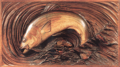 The monumental relief carving "Striped Bass Fishing†by Leander Allen Plummer II excited the crowd. Measuring 35½ by 62 inches, the intricately carved panel realized $59,250.
