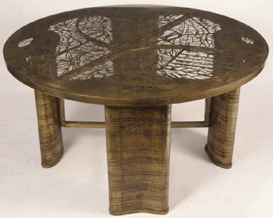 The Phillip & Kelvin Laverne round dining room table with patinated top went out at, $18,800, exceeding its $15,000 high estimate. 