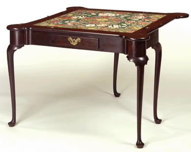 Before the Revolution, card tables were made mostly in sophisticated communities for prosperous clients. A Boston Queen Anne mahogany card table, circa 1754, was made to accommodate a colorful trompe l'oeil needlework by Mercy Otis Warren of Plymouth.