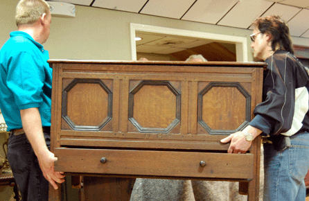 An early one-drawer blanket chest with the carved initials "M M†went to the phone for $8,512.