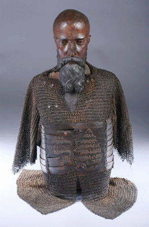 A Seventeenth Century Ottoman Empire chain-mail steel vest (iushman), on a wooden mannequin, sold to a London dealer against two determined floor bidders at $26,290.