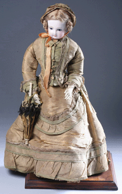An absolutely lovely French fashion doll retained her original clothes and accessories; in pristine condition, the 16-inch-tall Nineteenth Century doll realized $2,868.