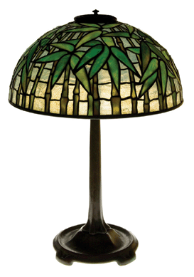 A Tiffany Studios bronze and leaded Favrile glass Bamboo lamp realized $68,500.
