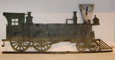 The Nineteenth Century New Hampshire sheet copper weathervane in the form of a steam locomotive adorned a New Hampshire barn since it was made. It sold on the phone for $21,850.
