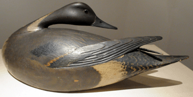 The crowd waited with anticipation for the Elmer Crowell carved preening pintail from the Harry Long collection to be sold. The lot opened at $275,000, with it selling moments later to a buyer in the rear of the room for $546,250.