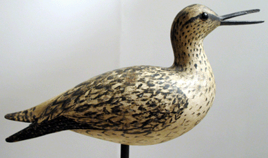 The Elmer Crowell open bill calling yellowlegs with carved drop wings from the Harry Long collection sold to South Carolina collector Dick McIntyre at $172,500.