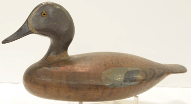 The blue wing teal drake made by "Harvey†Stevens of the Stevens Decoy Factory, Weedsport, N.Y., sold at $37,950.