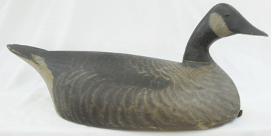 The George Warin Canada goose featured "strong original feather paint†on the desirable hollow-carved form. It sold at $24,150.