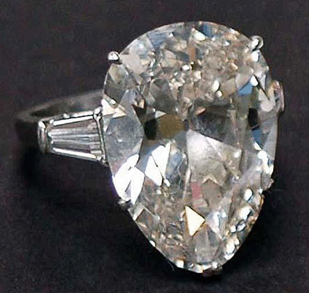 This pear-shaped 12.4-carat diamond in a platinum ring with baguettes sold for $75,000.