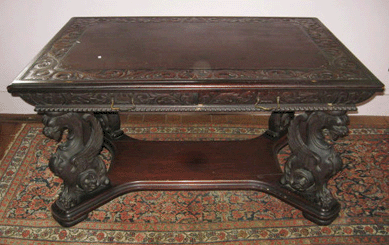 An unsigned mahogany R.J. Horner griffin partners' desk went home with a floor bidder at $2,600.