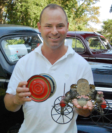 The rare tin hose reel toy sold for $48,875. Eldred's toy (and many other arenas) specialist Eric Mulak spotted it in a Cape Cod home and did the research.