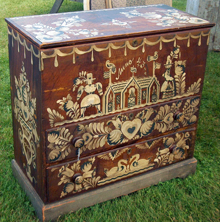 Show promoter Paul Davis was an antiques dealer long before he was producing antiques shows, and now he has begun selling again, here offering a Peter Hunt decorated blanket chest.