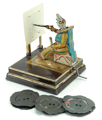 Tinplate crank-operated Vielmetter Clown Artist offered with four changeable cams enabling the clown to "draw†portraits realized $10,350.