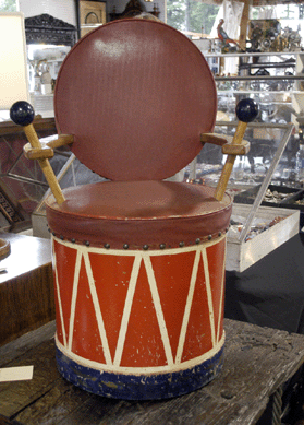 Any young boy would be delighted to sit in this antique chair in the form of a drum at Sukey Forbes, Boston, Mass. The colors were pleasing and vivid from the cobalt-tipped drumsticks to the red and cream drum base. ⁎ew England Motel