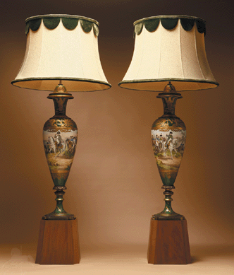 A pair of monumental Sevres-style gilt-metal mounted porcelain Napoleonic vases mounted as lamps more than doubled its high estimate, bringing $17, 250. 