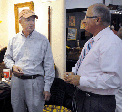 "This is one terrific show,†stated the customer in the center to promoter Butch Arion, right. "There is more fresh stuff here than I have seen in a long time,†he proclaimed.