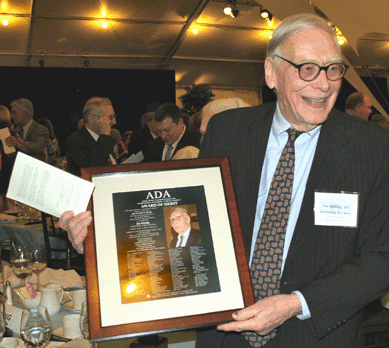Joe Kindig III proudly shows off his award plaque after receiving the ADA Award of Merit in 2008.