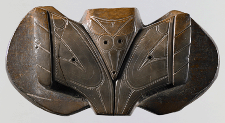 Harpoon counterweight, Okvik, OBS I, walrus ivory, 4½ inches wide. Private collection, New York. ⁂ruce M. White photo