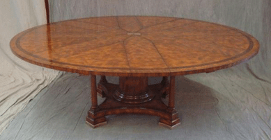 Regency-style radial dining table after Robert Jupe, with a mechanical movement that opens the table to put in the leaves; 60 inches in diameter without leaves, 84 inches with leaves. It sold just above its high estimate going for $5,581. 
