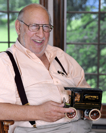 Donald Kaufman holds a tinplate delivery van advertising "Kaufmann's †The Big Store †Everything Under the Sun.†⁐hil Dutton photo, courtesy Bertoia Auctions