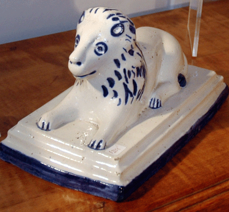 Jane Langol Antiques, Medina, Ohio, brought this charming reclining lion that came from the Crookstown area of Ohio.