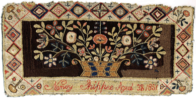 The selection of folk art included this American pictorial hooked rug by Nancy Shippee. It saw very active bidding, bringing $32,200.