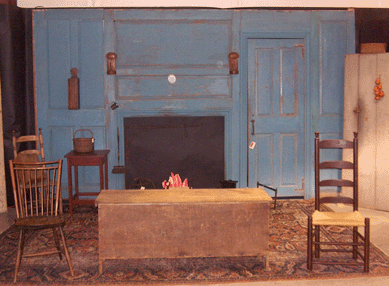 In the first few hours of the show, Richmond House Antiques, Ashford, Conn., sold the blue painted wood panel wall, mantel and doors that came from an early New England house.