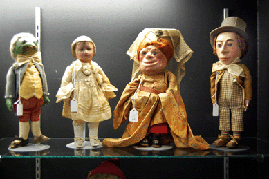 Alice in Wonderland and her pals the Frog Footman, the Duchess and the Mad Hatter, circa 1920, cloth dolls by the Martha Chase Company of Pawtucket, R.I., sold for $40,290.