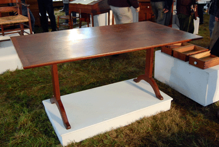A New Lebanon cherry ministry trestle table in the original red brought $117,000.
