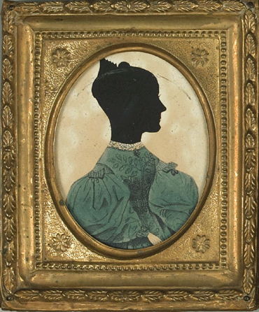 American printed and hollow cut silhouette of a lady, Nineteenth Century, 3½ inches.