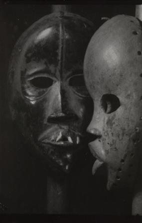 The primitive view of African art in much of Europe was reflected in noted Czech photographer Josef Sudek's "Cernosske masky,†1932, a novel picture of two Dan masks from the Ivory Coast. "To further enhance the magical and spiritual quality of the sculptures, he placed them against a dark background,†says Czech photographic historian Tomas Winter. By having the masks slowly emerge from the shadows, Sudek "reflected contemporary stereotypes of Africa as a dark and dangerous continent.†Museum of Decorative Arts, Prague. 