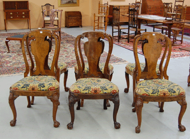 The set of six George II carved walnut side chairs attributed to the London maker Giles Grendey brought $63,180.