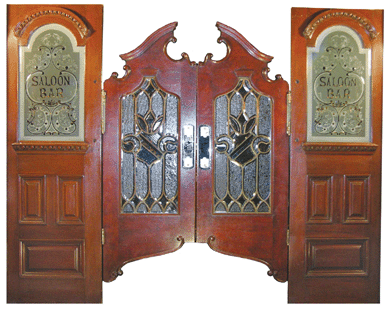 Solid mahogany swinging saloon doors by Brunswick, Balke & Collender Co., realized a record $77,000.