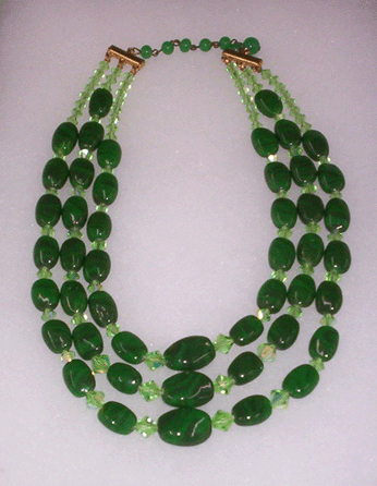 Bidding was fierce on this 1950s costume jewelry jade necklace that hammered down at $310.