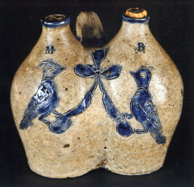The rare double jug, or gemel, made in New Haven, Conn., was marked with an "M†on one side and a "B†on the other, presumably for the cooking spirits Madeira and brandy. With a rare incised decoration of pheasants on a branch with a floral sprig between them, the double jug, estimated at $15/25,000, sold at $24,725.