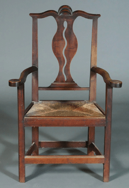 This Chippendale chair with snake cut-out achieved $19,550.