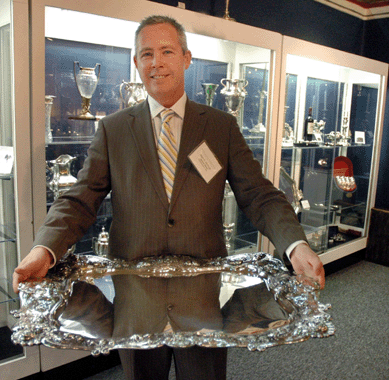 "One of the finest America silver trays we have ever seen,†said Mark McHugh of Spencer Marks, Westhampton, Mass. He is shown here holding the World's Columbian Exposition special order sterling silver tray by Gorham made in March 1893.