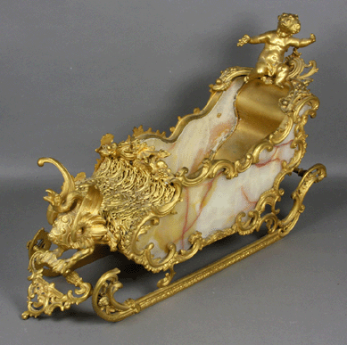 A Nineteenth Century gilt bronze sleigh-form vessel brought $5,750.