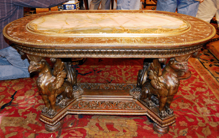 A walnut table with an onyx top supported by robustly carved griffins sold to an area collector on the phone for $36,800. The table was attributed initially to Horner, but some opinions included Roux. Auctioneer Peter L. Combs said he thought the piece was French.